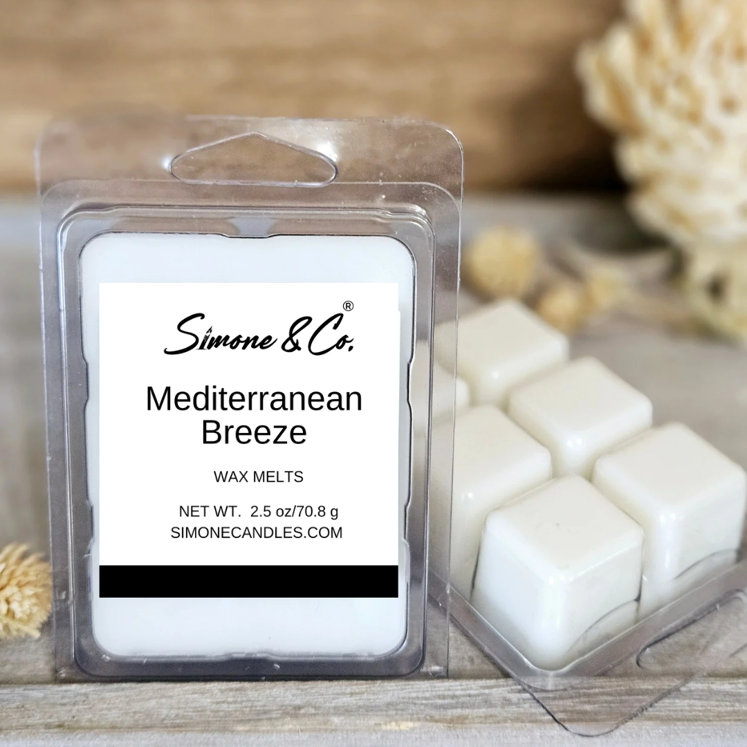 Packaging of 'Simone & Co. Mediterranean Breeze Wax Melts' with clear plastic front showing white wax melts inside.